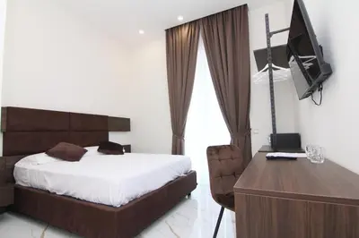 Letto o letti in una camera di AuRoom