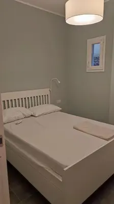Letto o letti in una camera di 109C Mezzocannone Cozy apartament Centro Storico