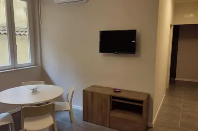TV o dispositivi per l'intrattenimento presso 109C Mezzocannone Cozy apartament Centro Storico