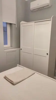Letto o letti in una camera di 109C Mezzocannone Cozy apartament Centro Storico