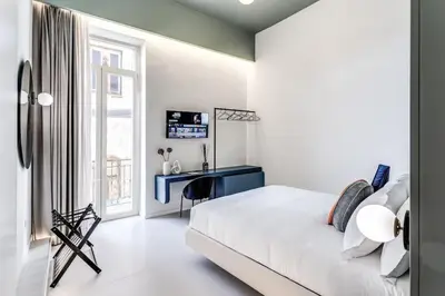 Letto o letti in una camera di Corso Umberto 228 - Sofia Apartments