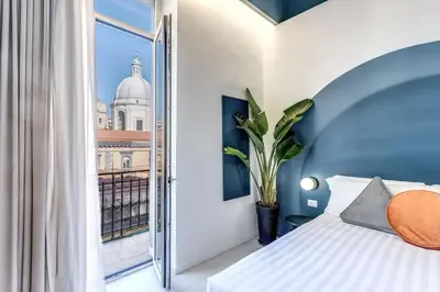 Letto o letti in una camera di Corso Umberto 228 - Sofia Apartments