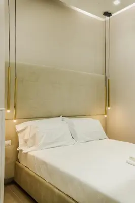 Letto o letti in una camera di Conte Relais Suite
