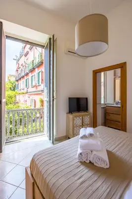 Letto o letti in una camera di Smooth Vibes at Chiaia by NapoliApartments
