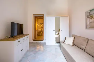 TV o dispositivi per l'intrattenimento presso Smooth Vibes at Chiaia by NapoliApartments