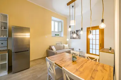 Cucina o angolo cottura di Smooth Vibes at Chiaia by NapoliApartments