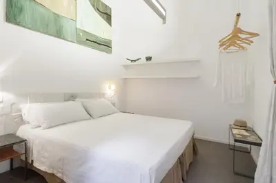 Letto o letti in una camera di Tribu apartment