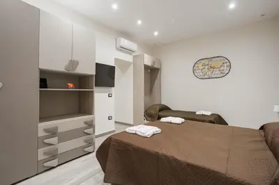 Letto o letti in una camera di Matteo's Home Napoli