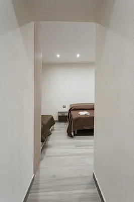 Letto o letti in una camera di Matteo's Home Napoli