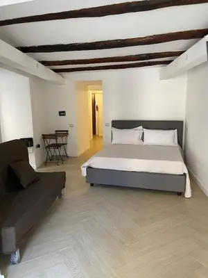 Letto o letti in una camera di Casa Nina - Egiziaca Apartment Luxury