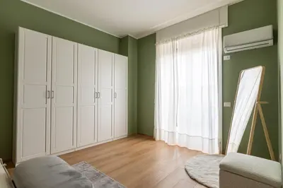 Letto o letti in una camera di Marittimo Luxury Apartment con vista Vesuvio