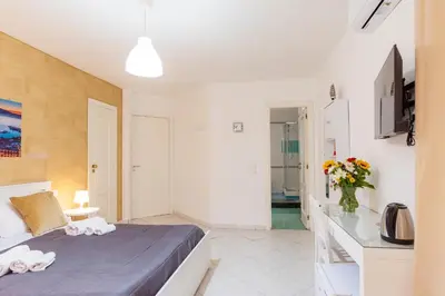 Letto o letti in una camera di Napoli centro, DM suites