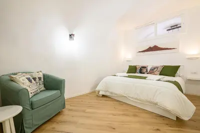 Letto o letti in una camera di A Tazzulella - Vico Graziella 12