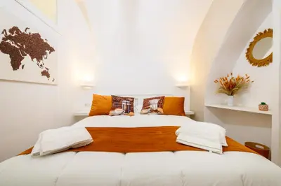 Letto o letti in una camera di A Tazzulella - Vico Graziella 12