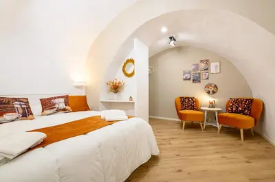Letto o letti in una camera di A Tazzulella - Vico Graziella 12