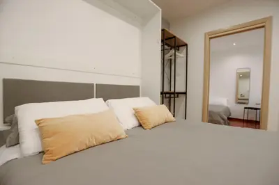 Letto o letti in una camera di DOMUS Gallery
