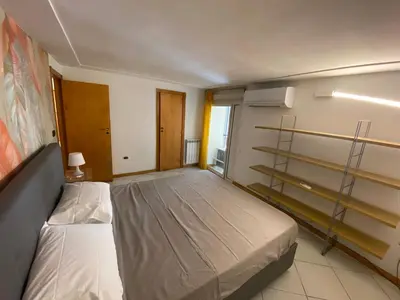 Letto o letti in una camera di Dimora Tribunali 236