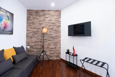 TV o dispositivi per l'intrattenimento presso Napoli Factory Guest House