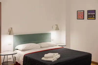 Letto o letti in una camera di Dante Studio Apartment Super Central next metro By HouseinNaples