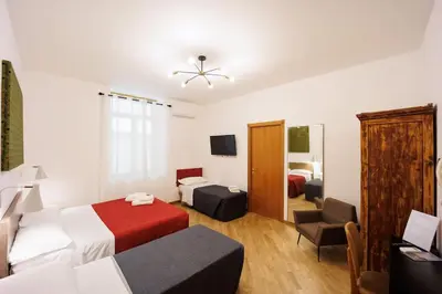 Letto o letti in una camera di Dante Apartament for Group and Family By HouseinNaples