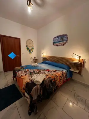 Letto o letti in una camera di 'A tarantella
