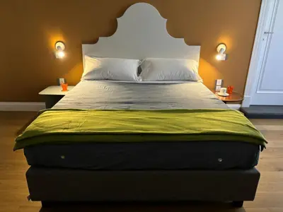 Letto o letti in una camera di IL MASTIO Panoramic GUESTHOUSE