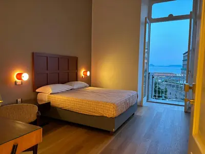 Letto o letti in una camera di IL MASTIO Panoramic GUESTHOUSE