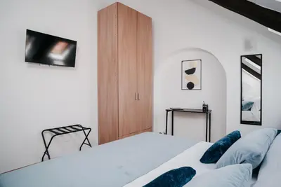 Letto o letti in una camera di Un Posto al Duomo