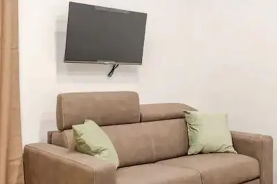 TV o dispositivi per l'intrattenimento presso Residenza Amato Suites