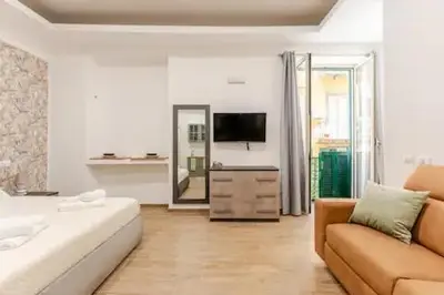 TV o dispositivi per l'intrattenimento presso Residenza Amato Suites