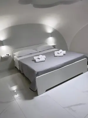 Letto o letti in una camera di Casa MrGio