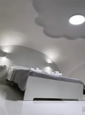 Letto o letti in una camera di Casa MrGio