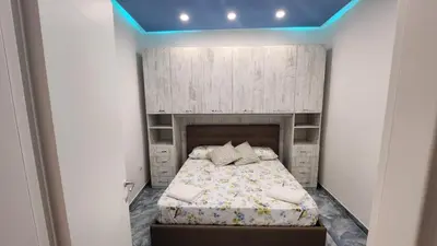 Letto o letti in una camera di Casa Ilaria