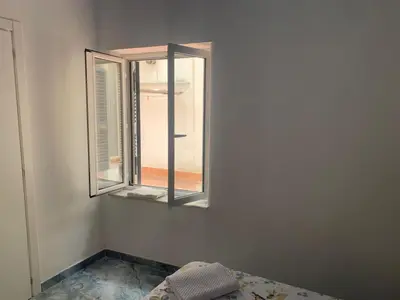 Letto o letti in una camera di Casa Ilaria