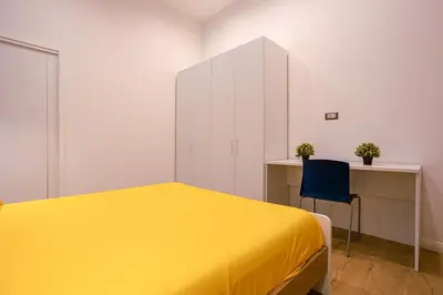 Letto o letti in una camera di Song House Apartment centro storico 5 pax