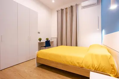 Letto o letti in una camera di Song House Apartment centro storico 5 pax
