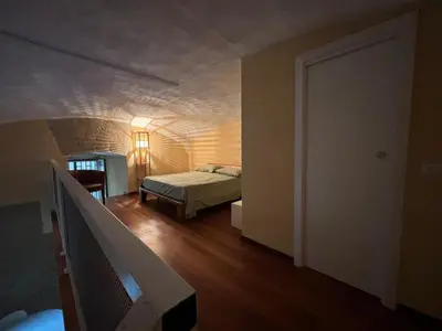 Letto o letti in una camera di La casa nel tufo