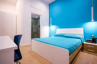 Letto o letti in una camera di Song House Apartment centro storico 7 pax