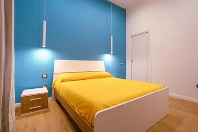 Letto o letti in una camera di Song House Apartment centro storico 7 pax