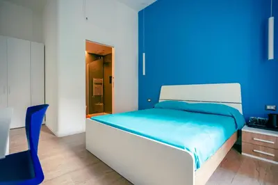 Letto o letti in una camera di Song House Apartment centro storico 7 pax