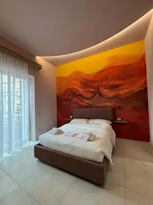 Letto o letti in una camera di Momó