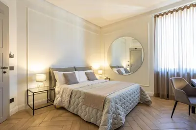 Letto o letti in una camera di Boemì smart suites