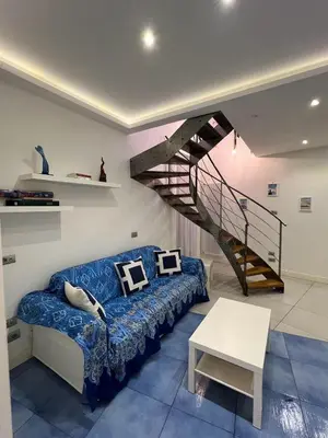 Area soggiorno di DEA Plebiscito - Donna Elena Apartment Plebiscito