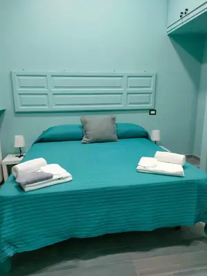 Letto o letti in una camera di B&B A casa di Freddie
