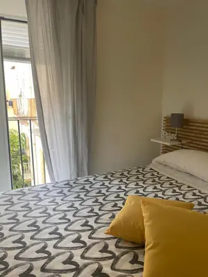 Letto o letti in una camera di Napoli a Piignatelli