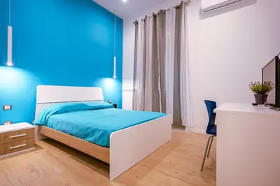 Letto o letti in una camera di Song House centro storico 2 pax