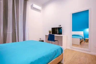Letto o letti in una camera di Song House centro storico 2 pax