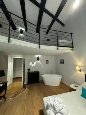 Letto o letti in una camera di La Maison Toledo