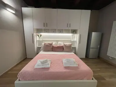 Letto o letti in una camera di Dimora Aragonese
