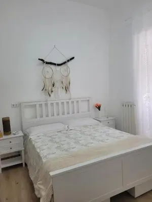 Letto o letti in una camera di CasaMaria